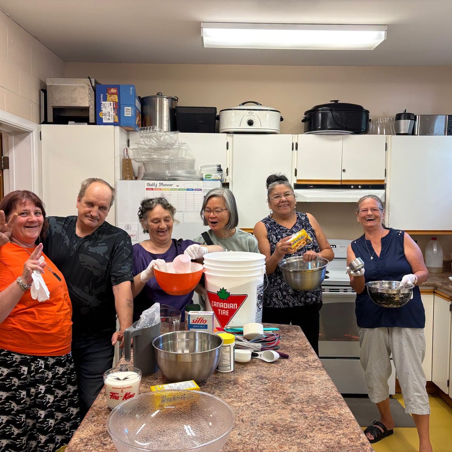 Community kitchen cooking together